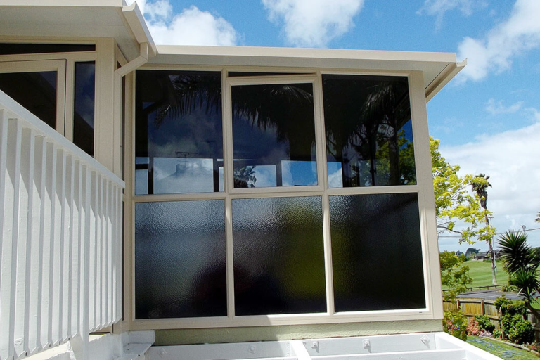 Aluminium joinery newly painted white
