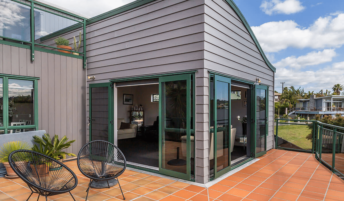 Green aluminium window frames need to be repainted