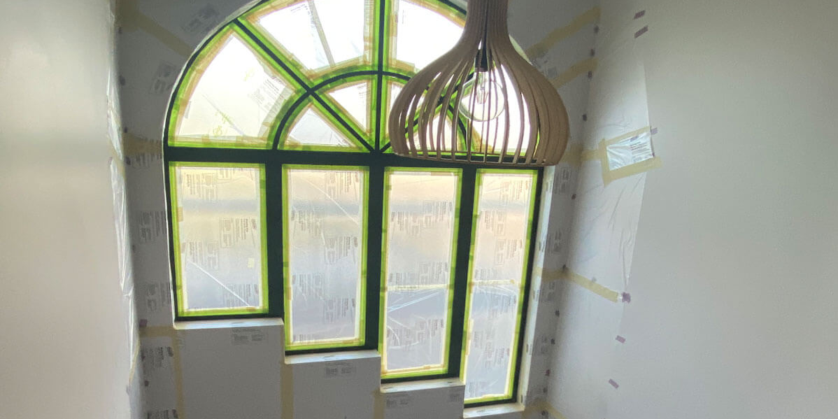 BEFORE03-1198×700 Arch window frames prepped for painting