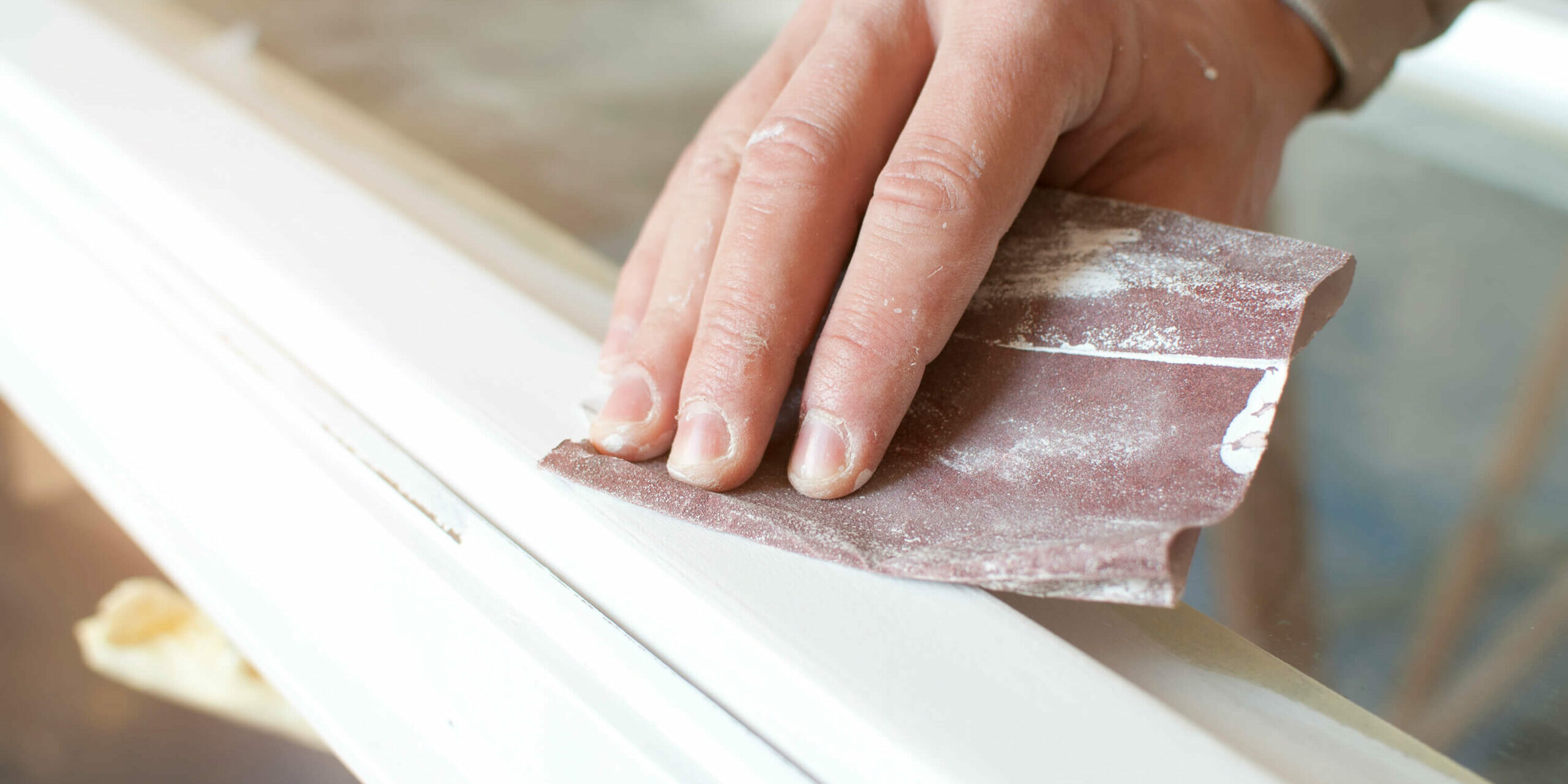 Systemex-Process-Sanding Sanding aluminium windows to prep for painting.