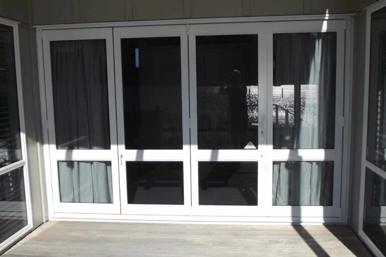 Aluminium joinery resprayed white.